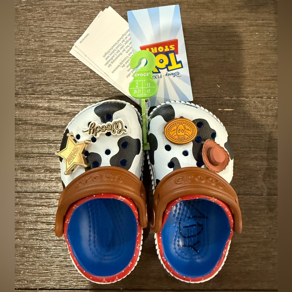 CROCS Kids' Toy Story Woody Clogs with Blue Footbed and Brown Strap Size C5